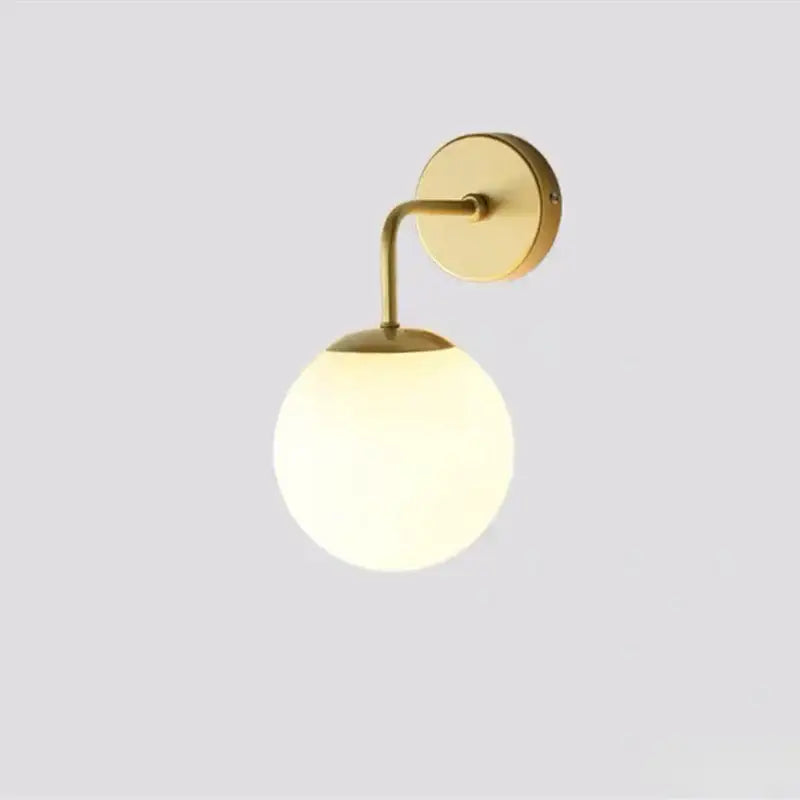 Modern gold and black led glass ball wall lights with gold-finished sconce and frosted glass globe for bedroom decorbites brozen black
