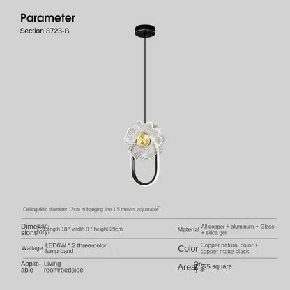 Modern gold and black led glass wall lamp featuring a delicate flower-shaped pendant light with clear glass bloom