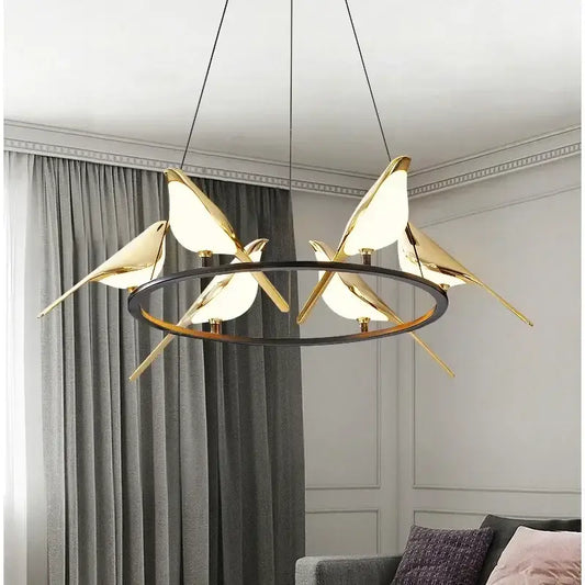 Modern gold and black magpie pendant light with iron finish and cord pendant installation on sleek black base