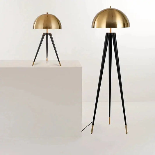Modern gold and black tripod floor lamp with brass accents by decorbites coyote for stylish living room decor