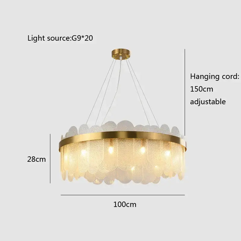 Modern gold and blue glass chandelier with frosted leaf glass shades and brass frame lighting solution for dining experience