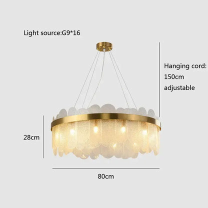 Modern gold and blue glass chandelier with frosted leaf-shaped shades offers a stylish lighting solution for dining experience