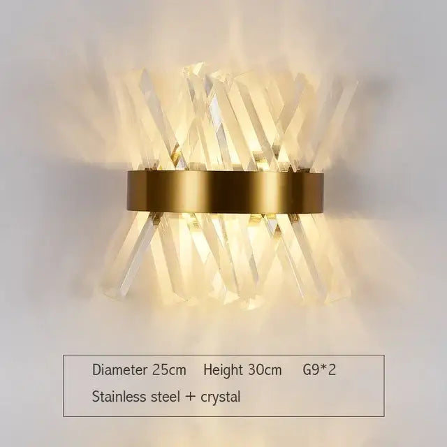 Modern gold and clear glass led wall lamp with crystal rods radiating from circular stainless steel base for bedroom use
