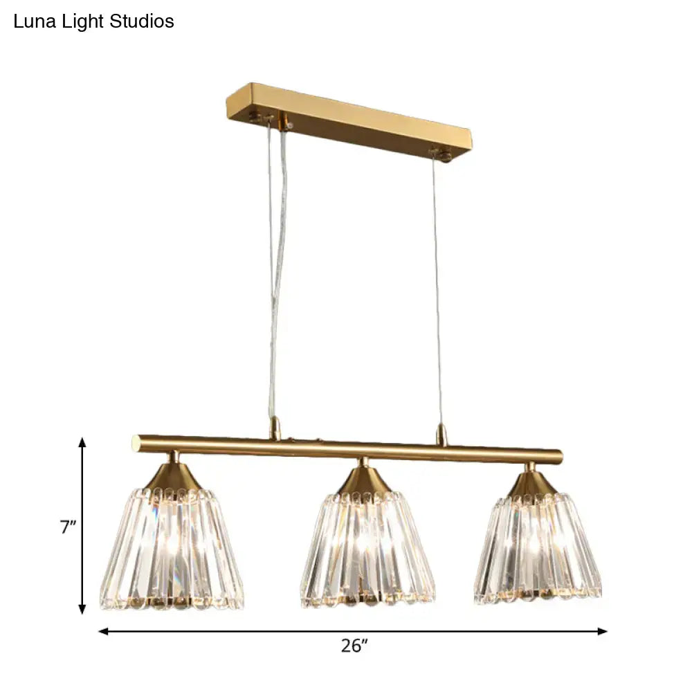 Modern gold pendant light with three clear crystal shades suspended from a brass bar 220v-240v for dining room
