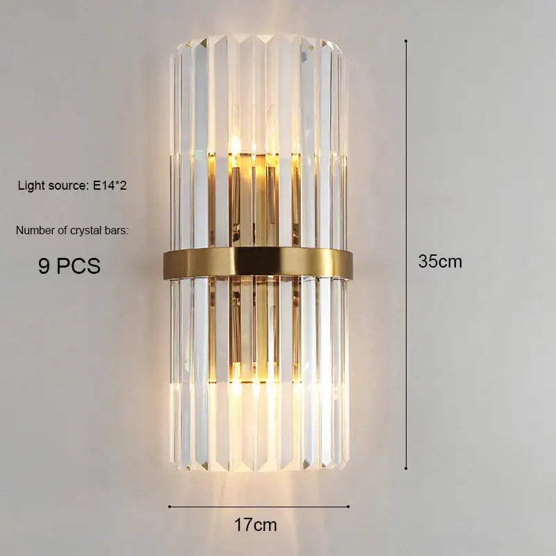 Modern gold and crystal wall light with vertical crystal bars and gold metal band illuminated by an e14 bulb for living room decorbites crystal wall