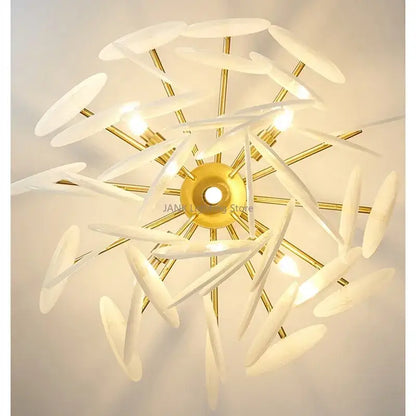 Modern gold and frosted glass led chandelier with translucent petal-like shades for dining room lighting