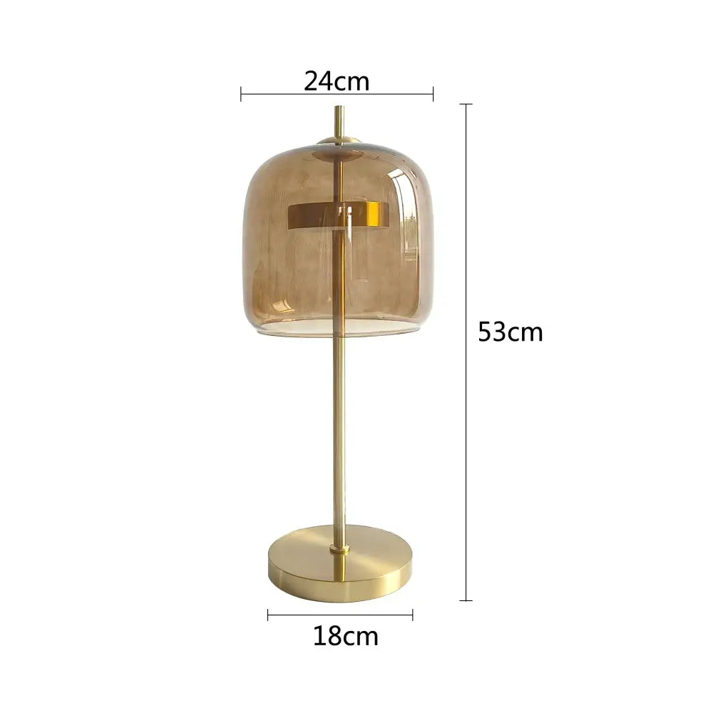 Modern gold and gray glass table lamp with translucent amber glass dome and metal base for bedroom decorbites decor