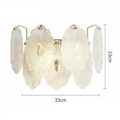 Modern gold and gray glass wall lamp featuring a delicate translucent white glass chandelier with fan-shaped designs
