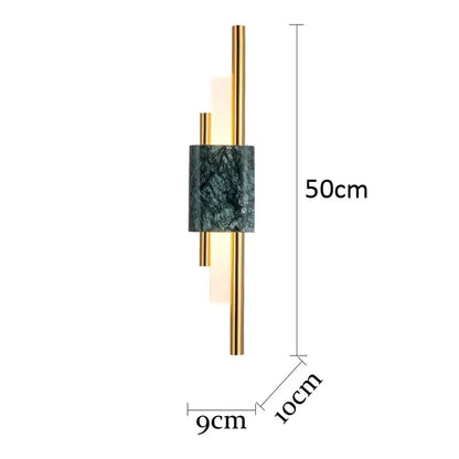 Modern gold and green marble wall lamp featuring a dark green marble cylinder and polished gold metal rods sconce