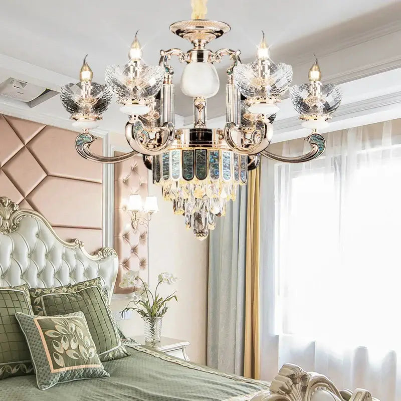 Modern gold and teal crystal candle chandelier with polished gold frame and floral glass shades by decorbites crystal candle
