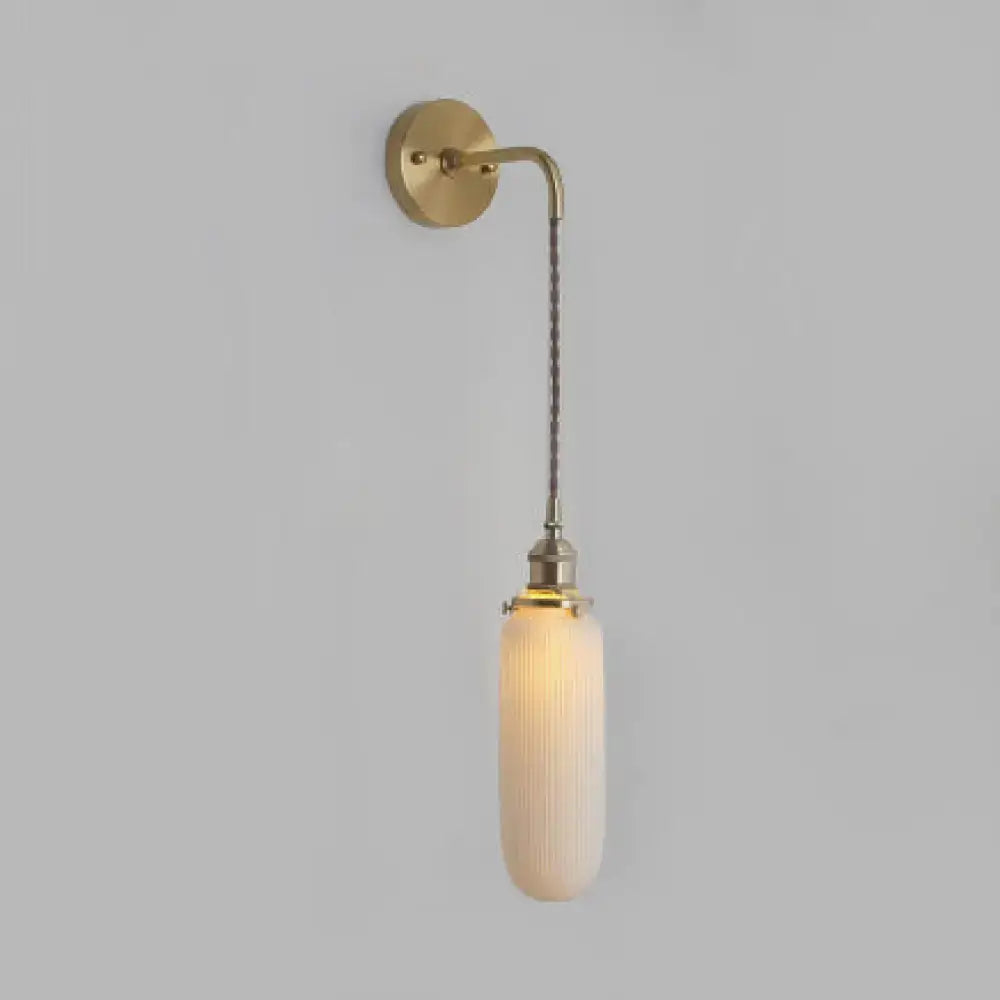 Slender decorbites modern porcelain white wall lamp with brass socket and ribbed shade ideal for dining room lighting