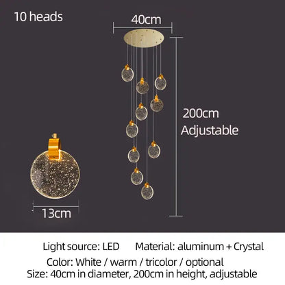 Modern gold attic crystal chandelier with ten adjustable crystal globes suspended from aluminum base for dining room