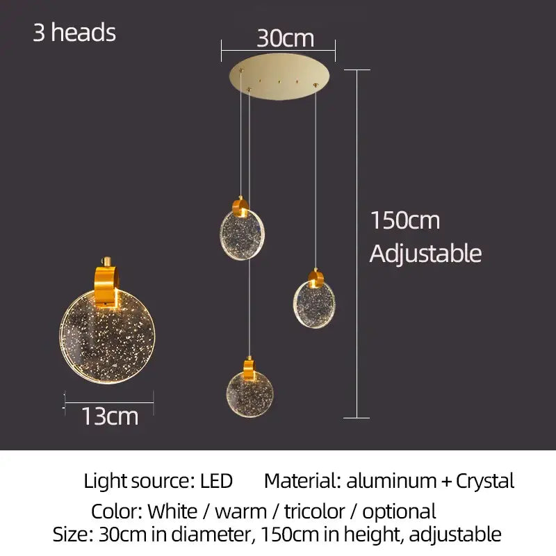 Modern gold attic crystal chandelier with three adjustable circular globes featuring a sparkling starry interior