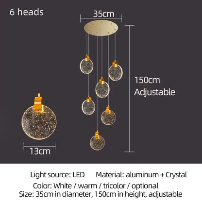 Modern gold attic crystal chandelier with six spherical glass shades and warm led lighting for dining room use