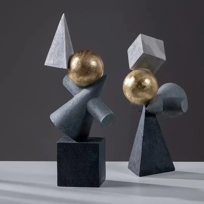 Two abstract geometric gold ball triangular statues with gray and white angular forms for living room decorbites decor