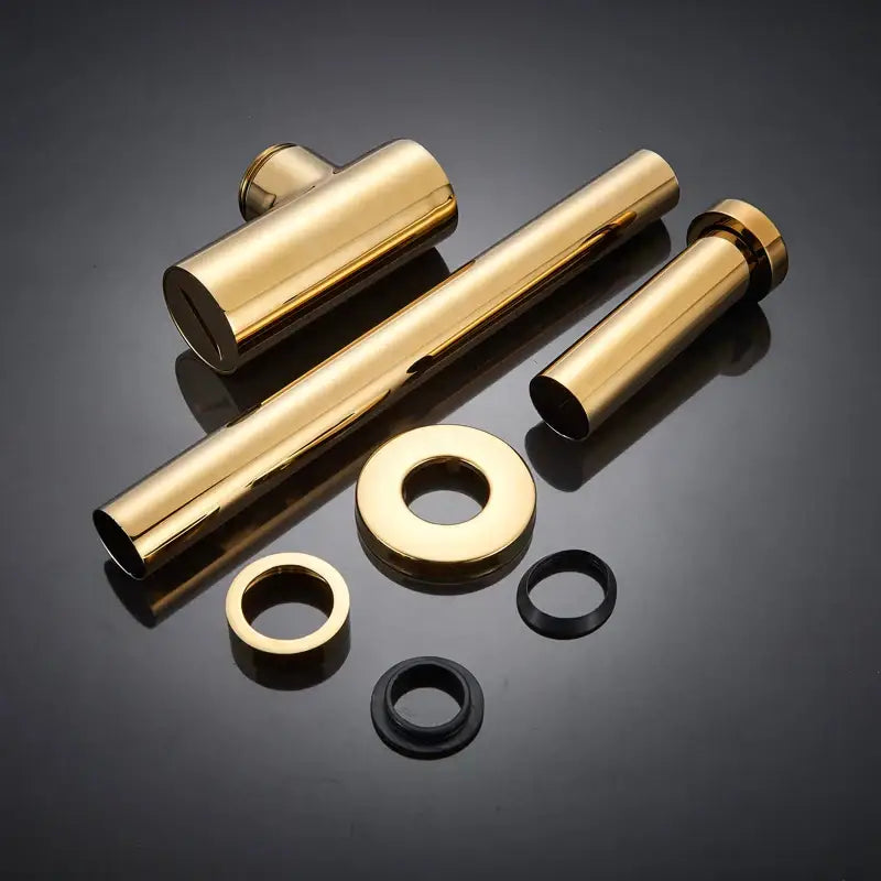 Modern gold basin tap kit featuring metal finish with cylindrical components and deodorization drain for bathroom use