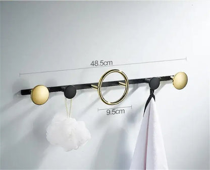 Modern gold and black brass towel hook set with circular hooks wall mounted for bathroom use