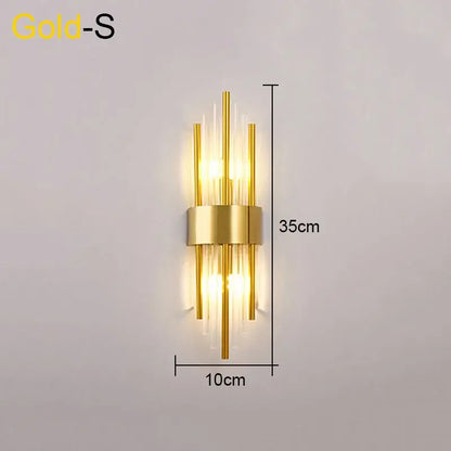 Modern gold and black decorbites crystal wall lamp with vertical gold rods and clear glass tubes for living room decor