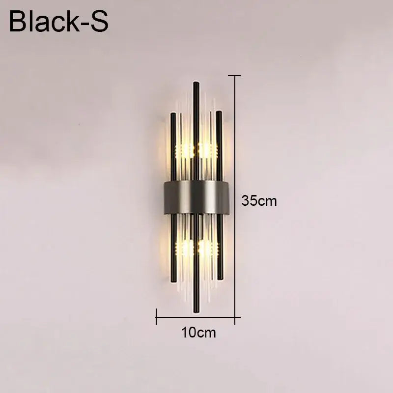 Modern gold and black decorbites crystal wall lamp with sleek vertical rods and clear glass accents for living room wall lamp decor