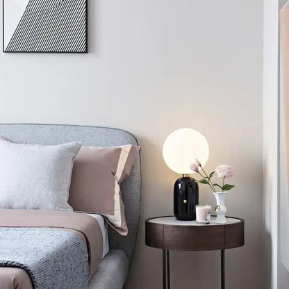 Black ceramic desk lamp with a round frosted glass globe shade decorbites glass ball led bedroom light