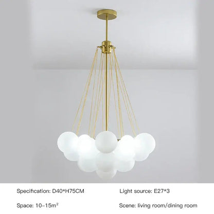 Modern gold and black chandelier featuring frosted glass ball shades for dining room decorbites frosted glass design