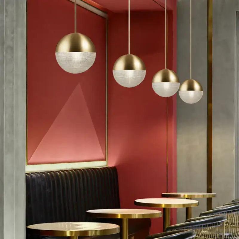 Modern gold and black glass ball led pendant light with gold finished spherical fixture and textured white glass shade decorbites glass ball