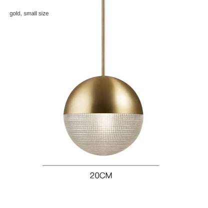 A sleek modern gold pendant light with a decorbites glass ball led design for bedroom decor