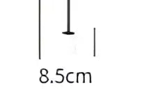 A black minimalist ruler with precise white markings beside a modern gold and black glass globe pendant light with metal detailing