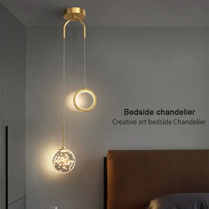 Modern gold and black glass globe pendant light featuring selectable light colors and warm ambient lighting for dining rooms
