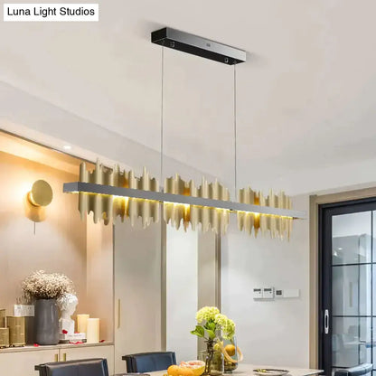 DecorBites Irene Iceberg Design modern gold-toned led chandelier lighting with sleek wave design for dining room