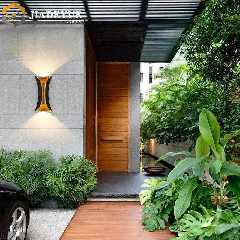 Modern gold and black led wall light with sleek bronze and black curved design for decorbites led wall garden decorbites led wall light