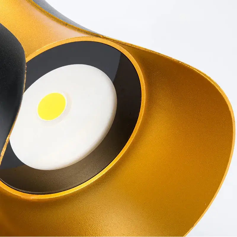 Modern gold and black led wall light with sleek curved design and bright yellow light for decorbites led wall use