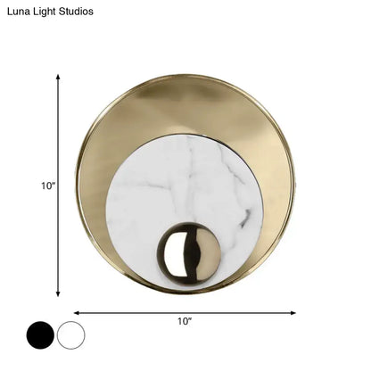 Modern gold and black marble peacock tail feather wall sconce with brushed gold frame and white marble center wall lamp