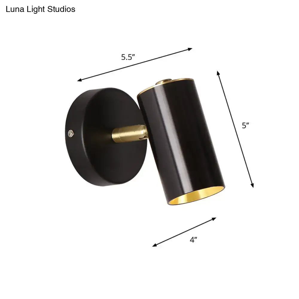 Modern gold and black metallic tube led light bedside wall sconce with cylindrical shape and matte finish