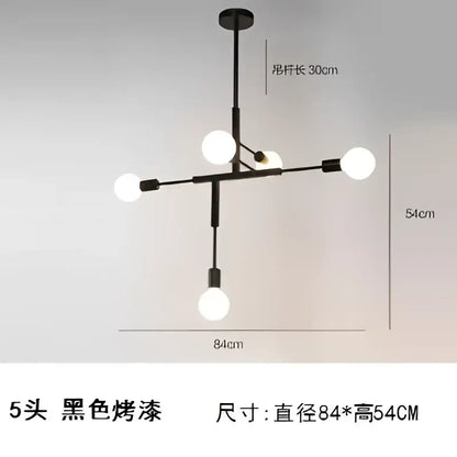 Modern gold and black pendant light with black finish and five white bulbs in decorbites cross style design
