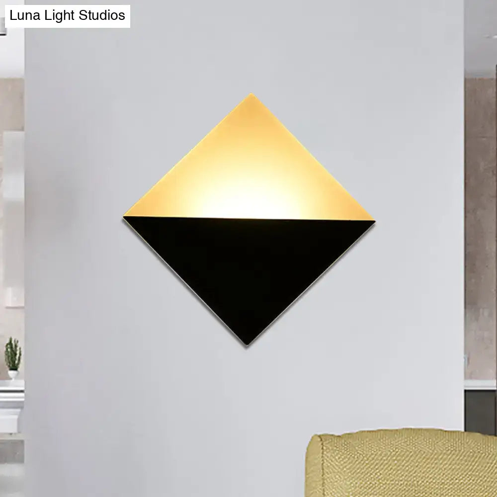 Modern gold and black diamond-shaped wall sconce LED light fixture with two-tone design and fixture height for bedroom use