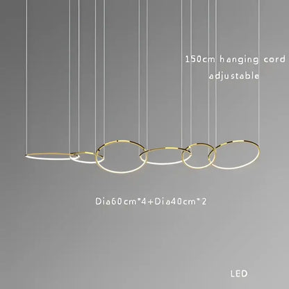 Modern gold and black stainless steel pendant lights featuring interconnected gold-toned rings for dining room decorbites gold stainless