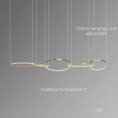Modern gold stainless steel pendant lights with three interconnected circular rings for dining room decorbites gold stainless