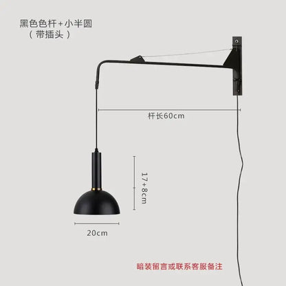 Black matte finish wall lamp with slender articulated arm and dome shade for decorbites gold black swing wall lamp design