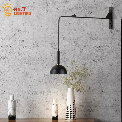 Modern gold black swing wall lamp with black matte finish curved arm and minimalist dome shade for bedroom decorbites gold black