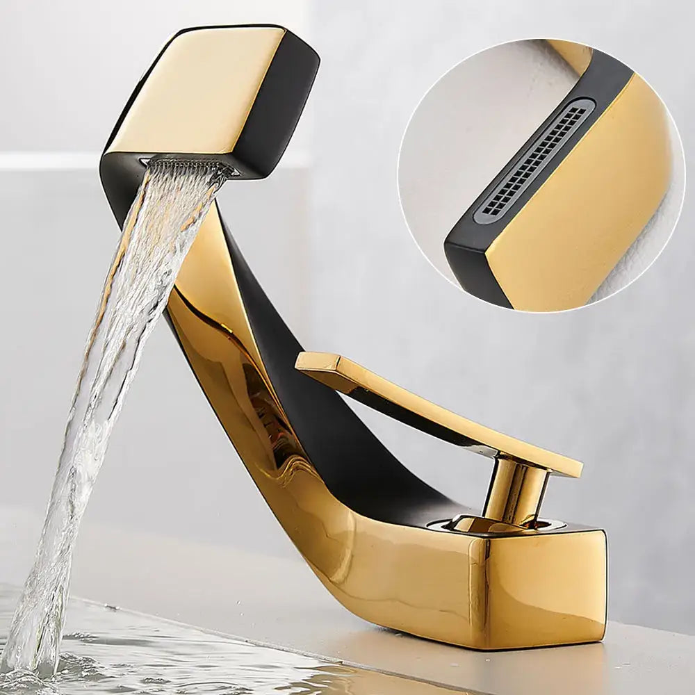 Modern gold and black waterfall basin faucet with sleek angular design for contemporary bathroom fixtures