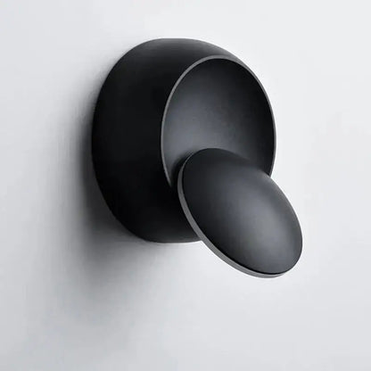 Black matte-finished wall-mounted hook with sleek modern design for decorbites adjustable led crescent wall light
