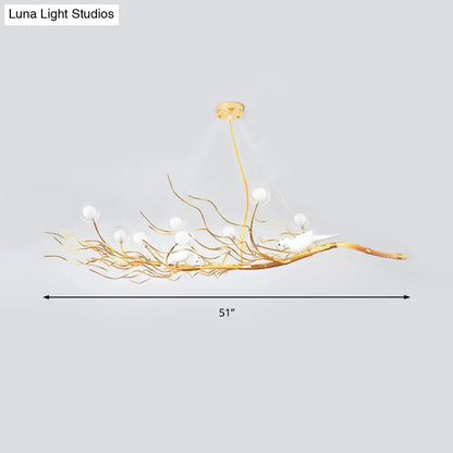 Decorbites modern gold branch pendant light with white bird accents and clear glass bulbs for dining room use