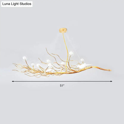 Decorbites modern gold branch pendant light with white glass bulbs and bird figurines ideal for dining room lighting