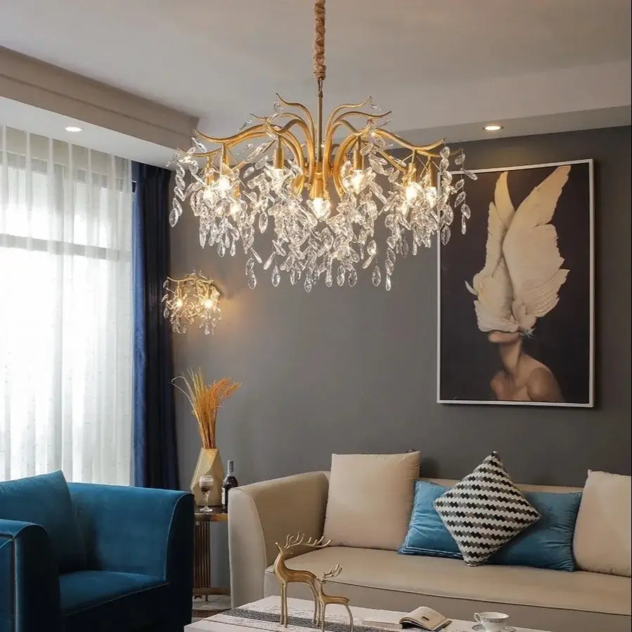 Modern gold branching decorbites crystal chandelier featuring intricate arms and cascading clear crystal droplets for living room