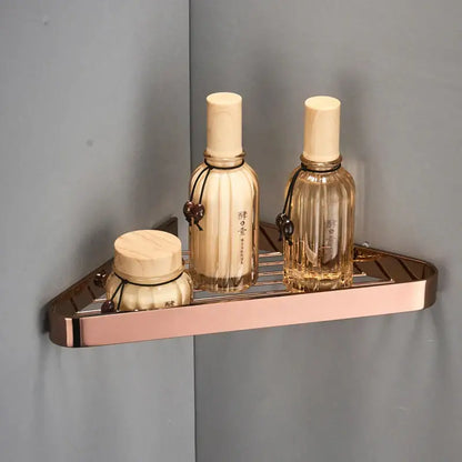 Modern rose gold brass bathroom shower rack with hooks and sleek grid surface for decorbites brass bathroom shelf use