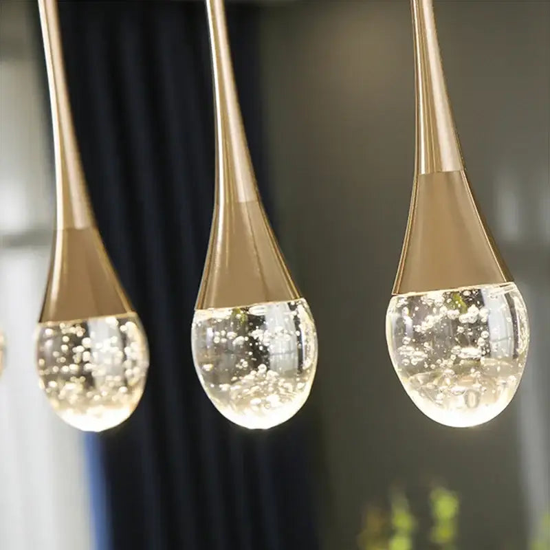 Modern gold bubble crystal chandelier pendant light with gold teardrop frames and clear glass globes filled with bubbles