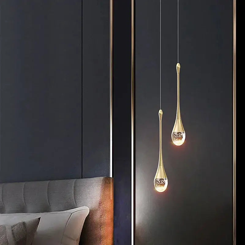 Two elegant gold pendant lights with bubble crystal chandelier glass interiors for modern dining room decorbites pendant light