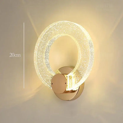 A modern gold bubble crystal pendant light with a sparkling translucent glass ring for living room use