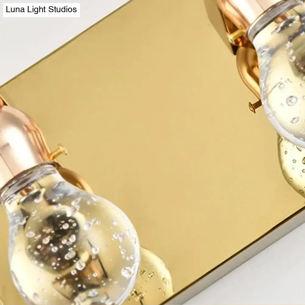 Modern gold bulb shaped crystal wall sconce with copper metal bases and internal bubbles for 110v-120v lighting